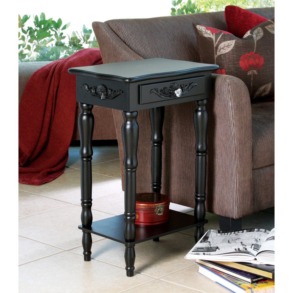 Carved black side table
