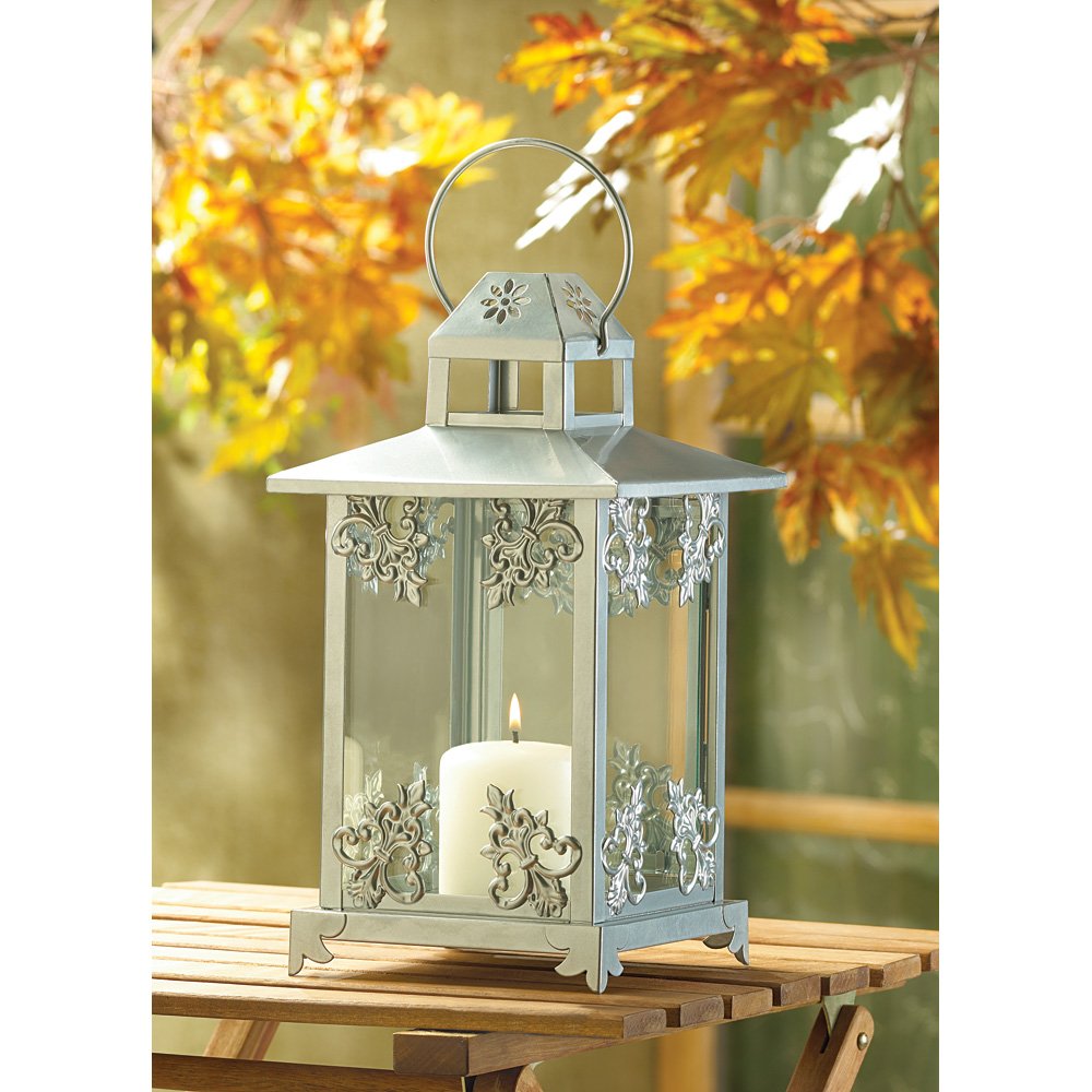 Silver scrollwork candlelantrn